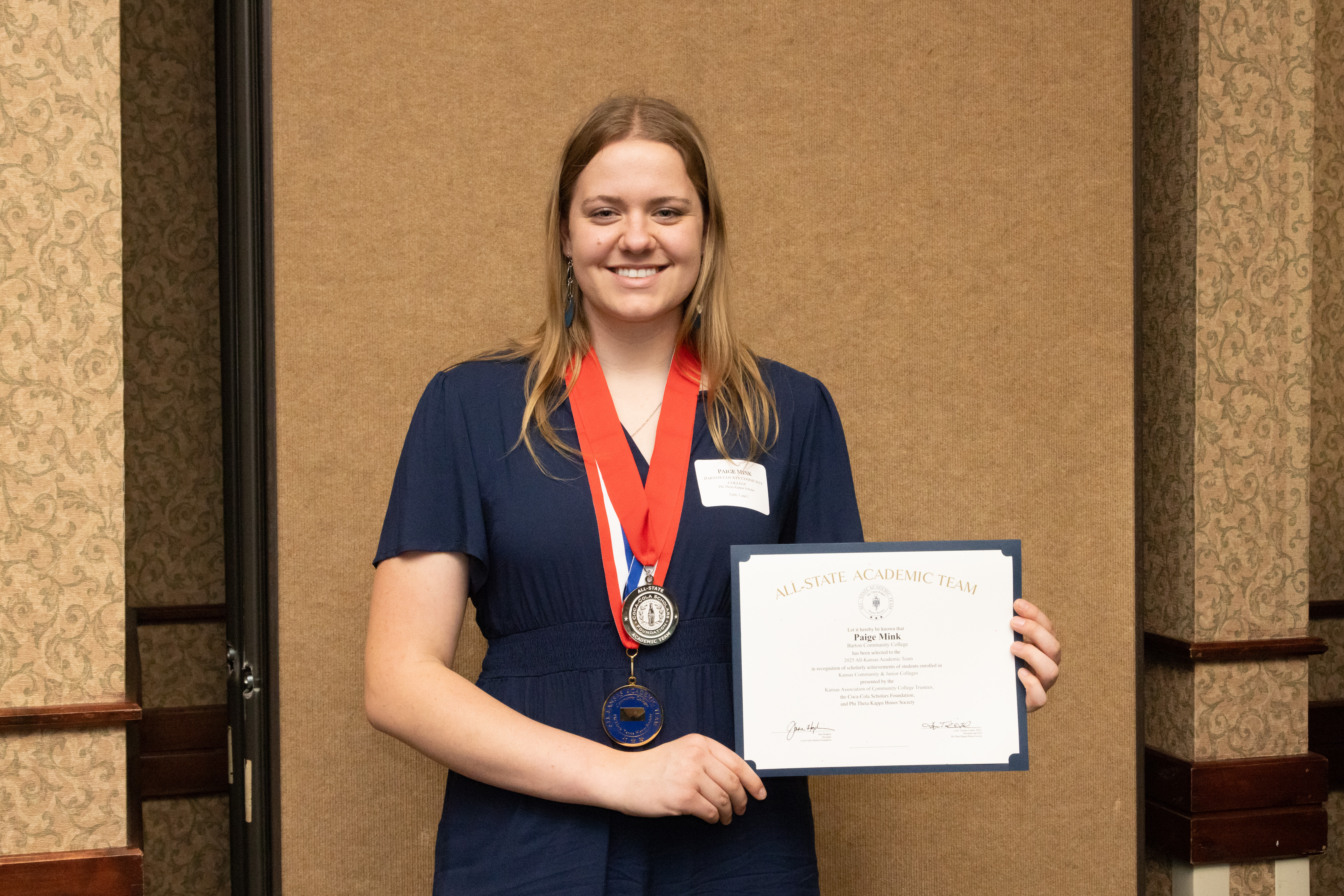 Barton Community College student Paige Mink was named to the Coca-Cola Academic Team as a silver scholar.