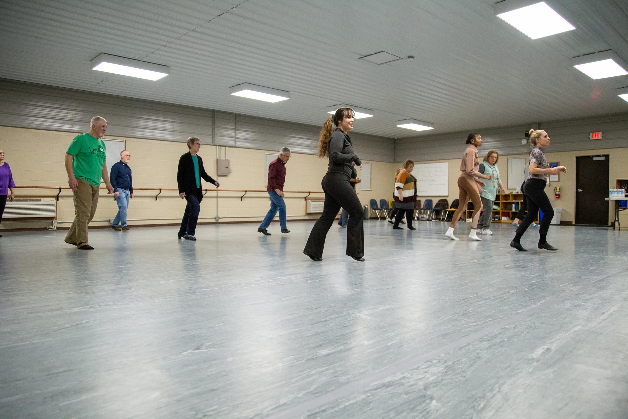 people dancing in a studio