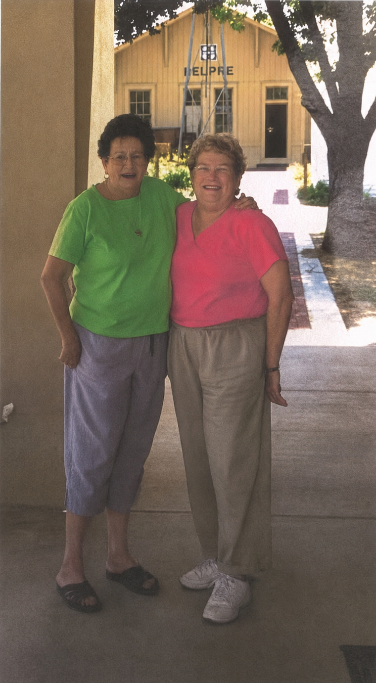 two women smiling