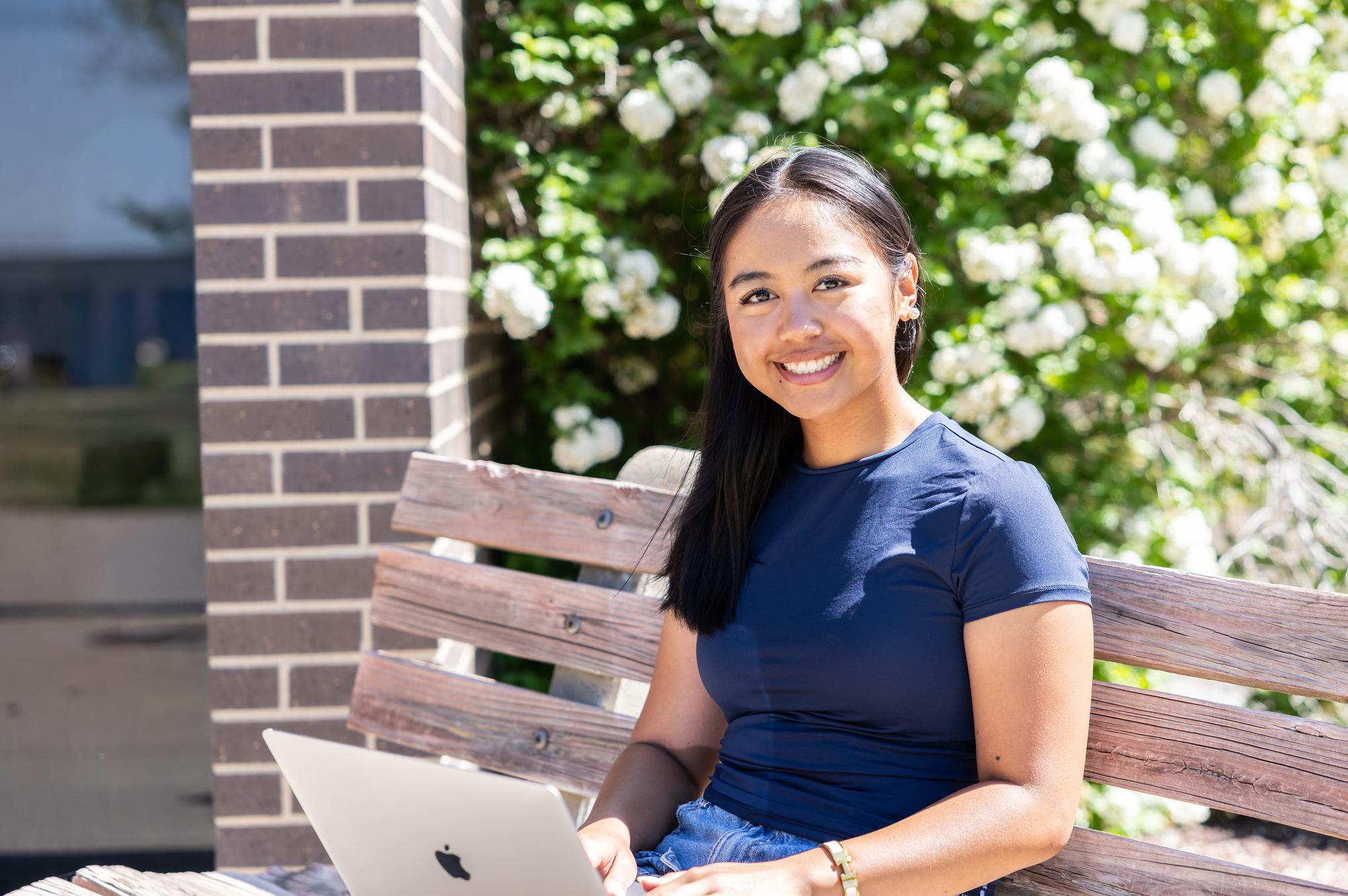 smiling laptop person