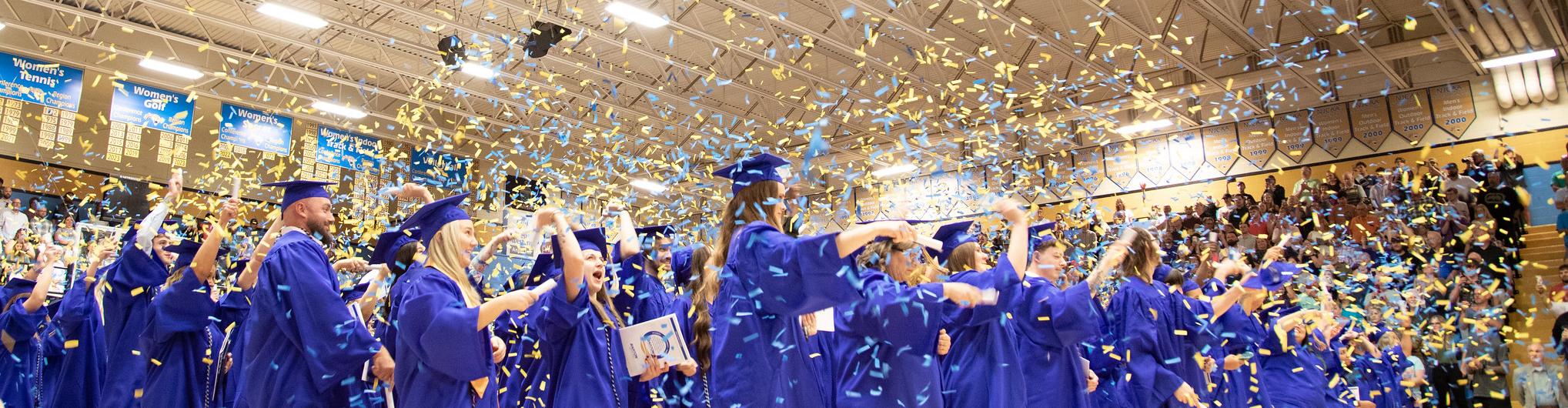 Barton graduates celebrate with confetti tubes at 2023 commencement ceremony