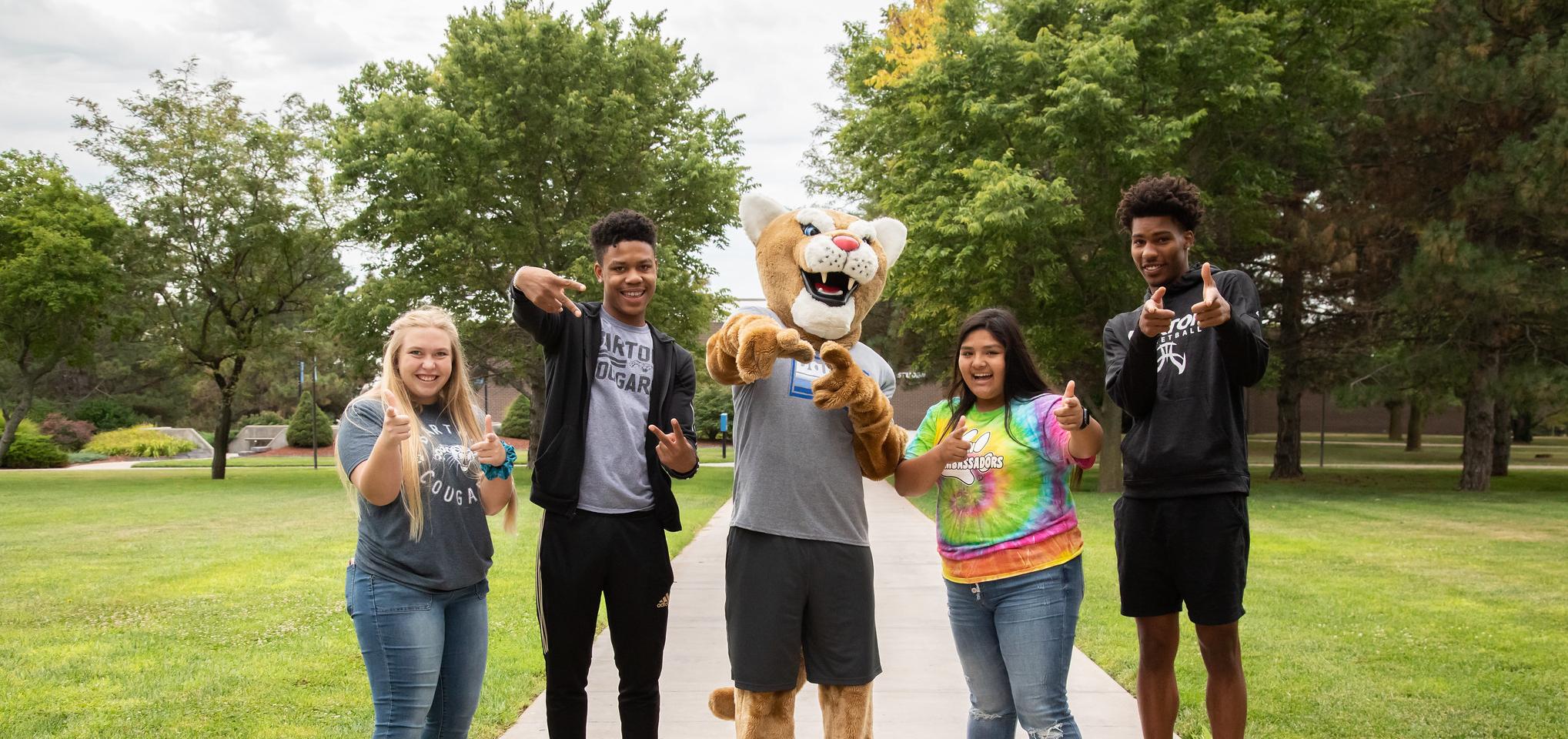 Bart hangs out with students on campus