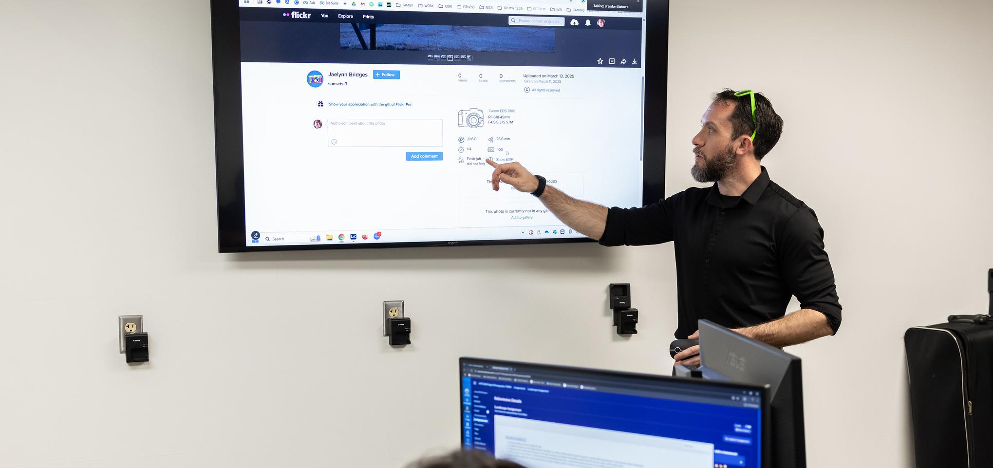 Instructor in a photography classroom presents information