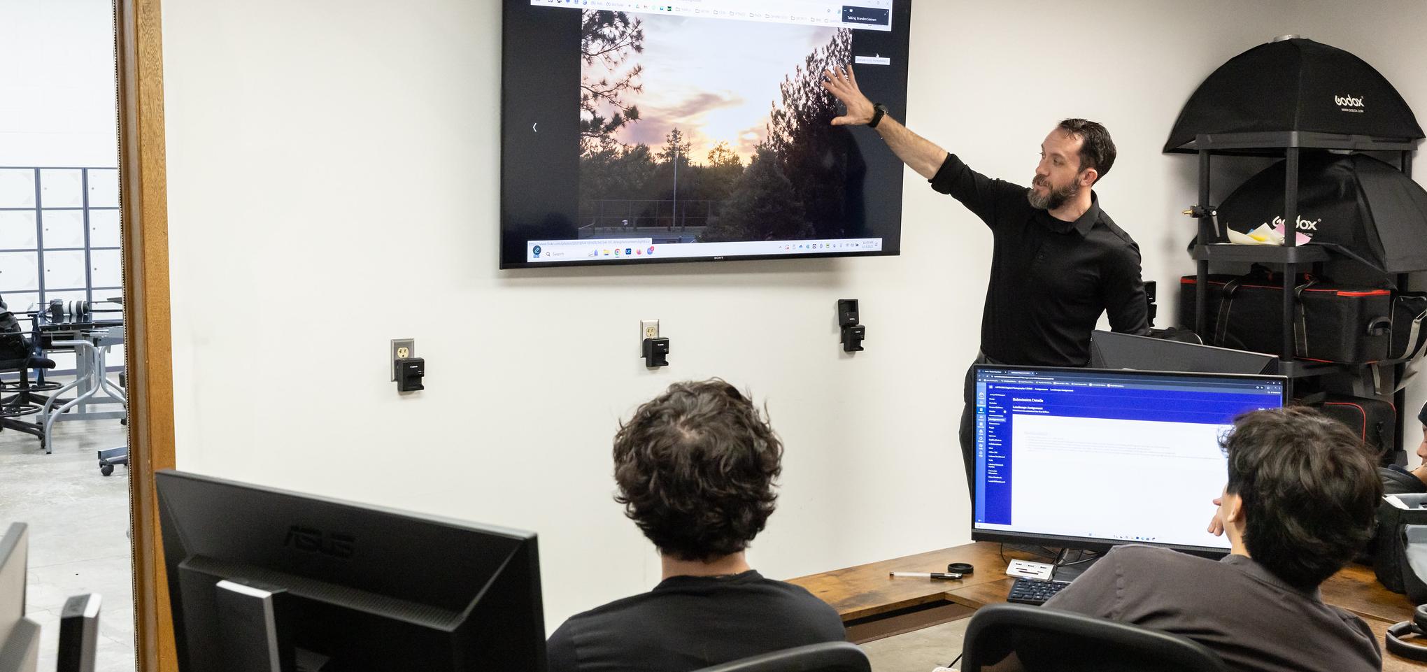 Digital Communications instructor in classroom