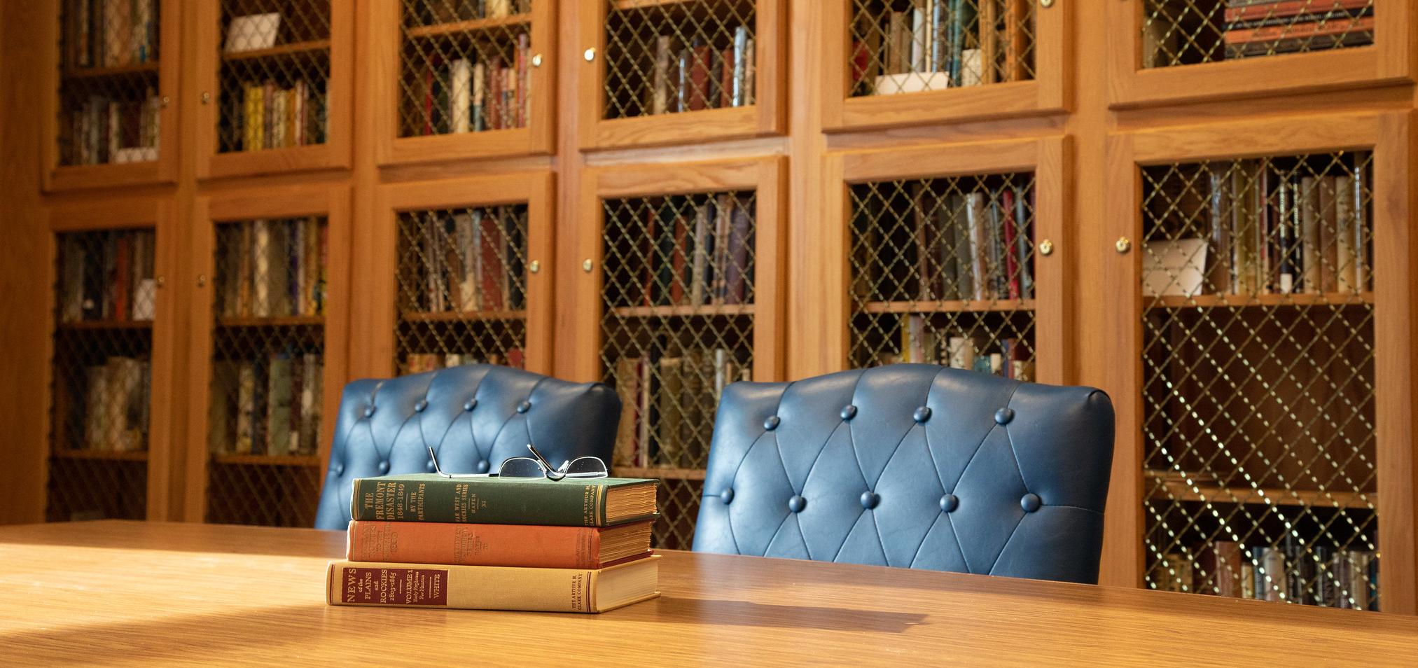 books sit on a table in the Cohen Center on the Barton campus