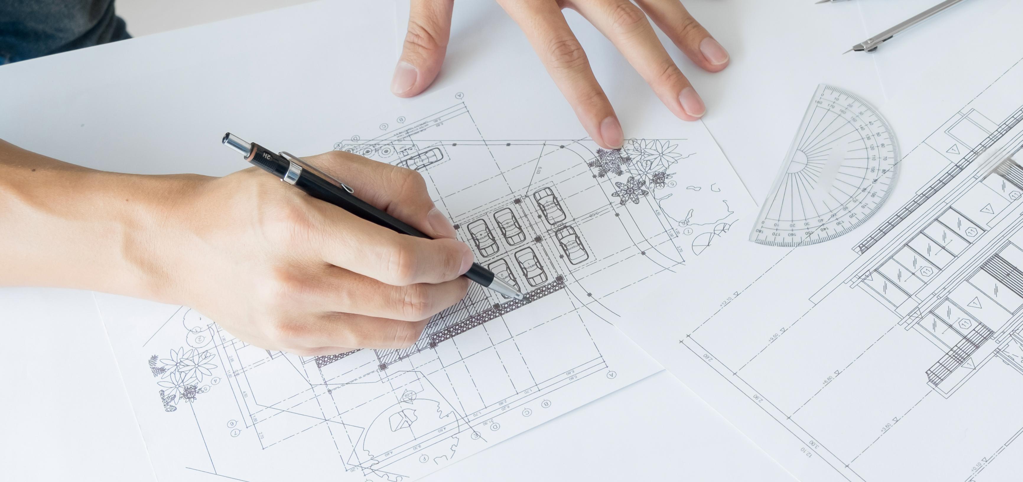 Architects draw plans 