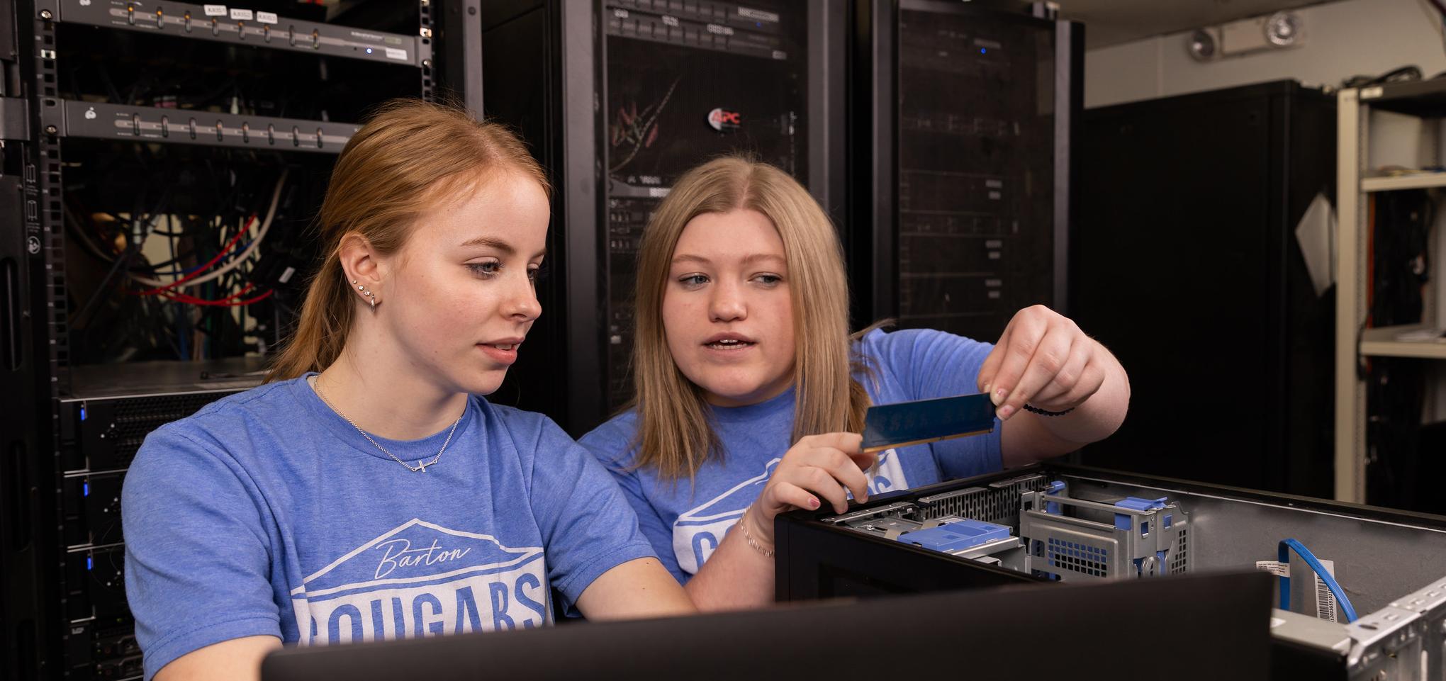 Computer students assess computer hardware