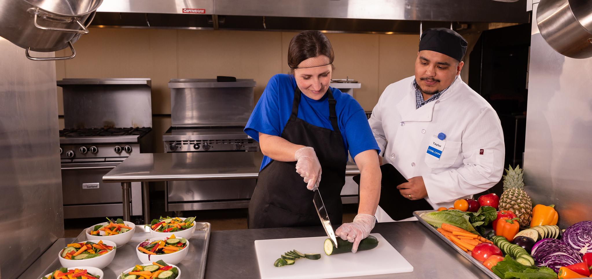 Dietary Manager and staff work to prepare meals for facilities