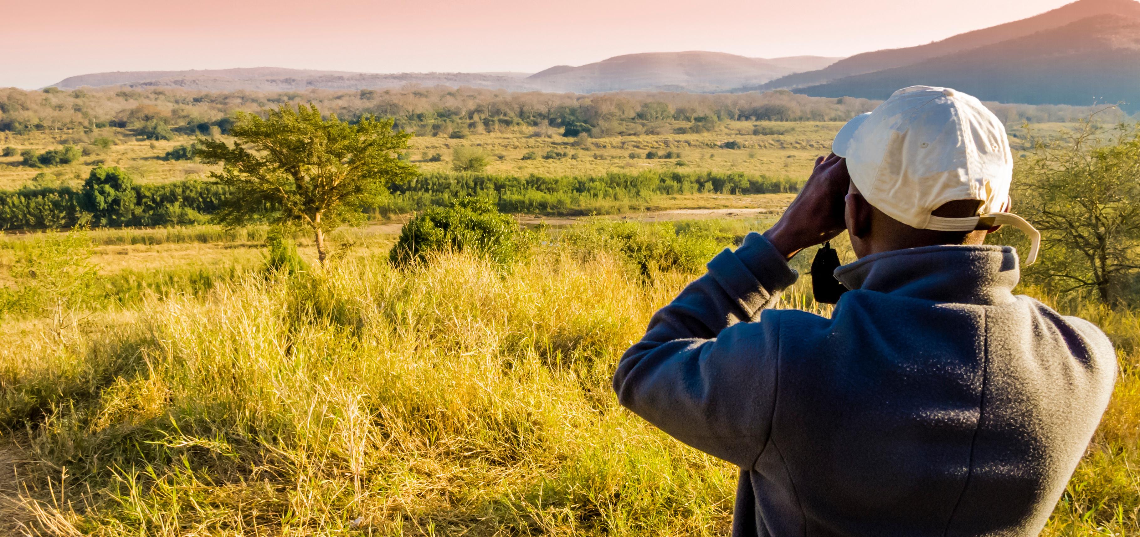 A Park Ranger overlooks natural park land